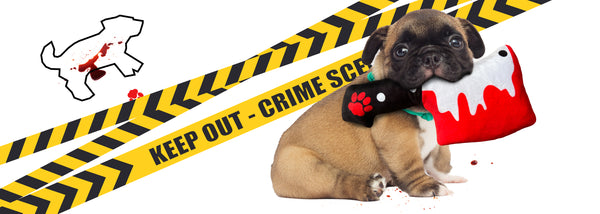 Puppy playing with bloody Cleaver Dog Toy MrsCopyCat
